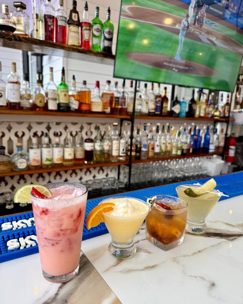 Summer-drink-lineup-outdoor-bar-with-sports-Elaines-Cape-May svg+xml;charset=utf -
